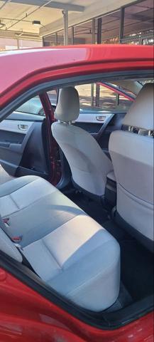Photo of 2014 Red Toyota Corolla