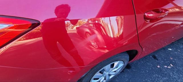 Photo of 2014 Red Toyota Corolla