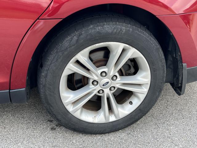 Photo of 2017 Beige Ford Taurus
