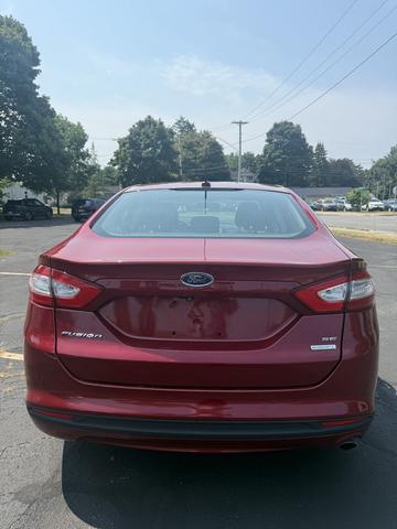Photo of 2014 Red Ford Fusion