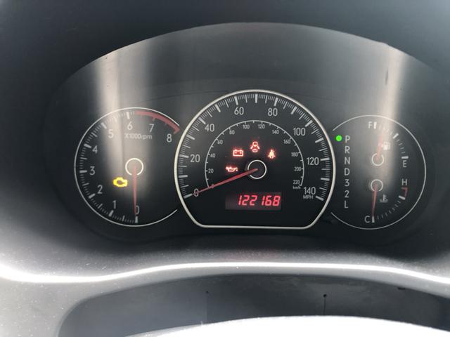 Photo of 2008 Orange Suzuki SX4