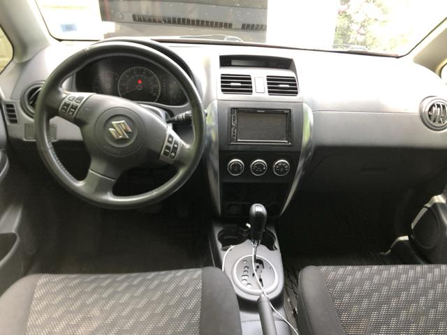 Photo of 2008 Orange Suzuki SX4