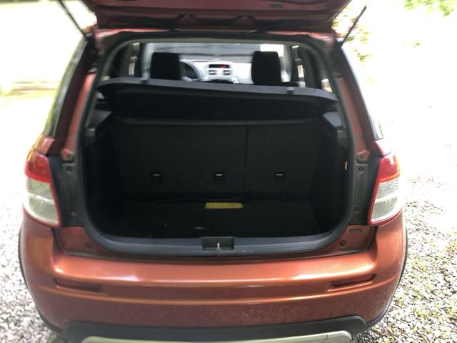 Photo of 2008 Orange Suzuki SX4