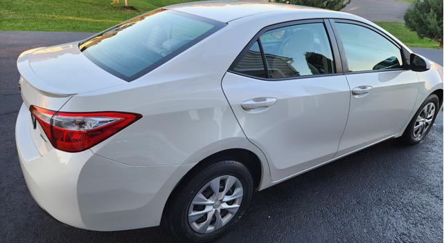 Photo of 2015 White Toyota Corolla