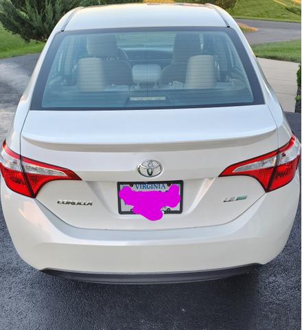 Photo of 2015 White Toyota Corolla