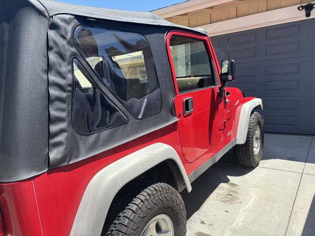 Photo of 2001 Red Jeep Wrangler