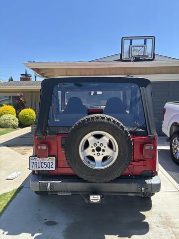 Photo of 2001 Red Jeep Wrangler