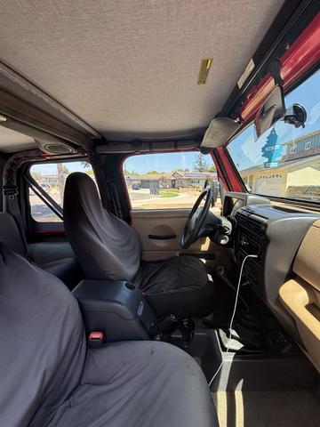 Photo of 2001 Red Jeep Wrangler