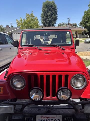 Photo of 2001 Red Jeep Wrangler