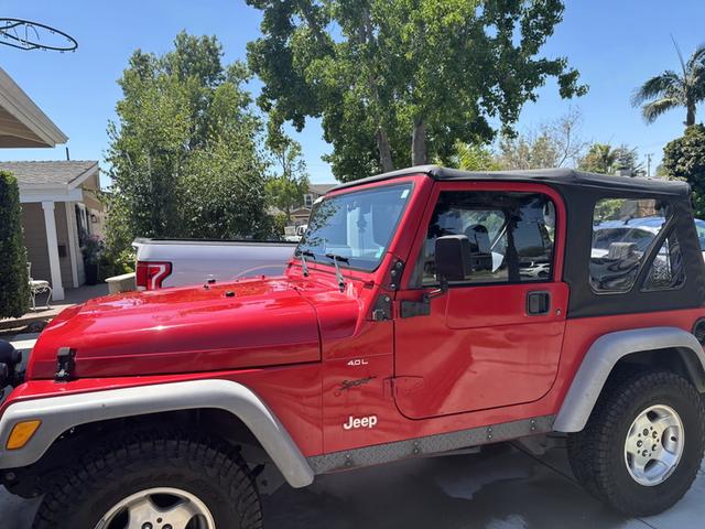 Photo of 2001 Red Jeep Wrangler