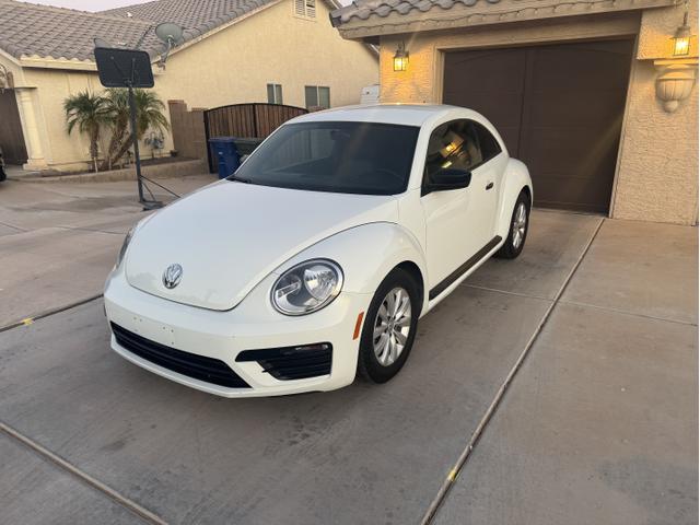 Photo of 2018 White Volkswagen Beetle