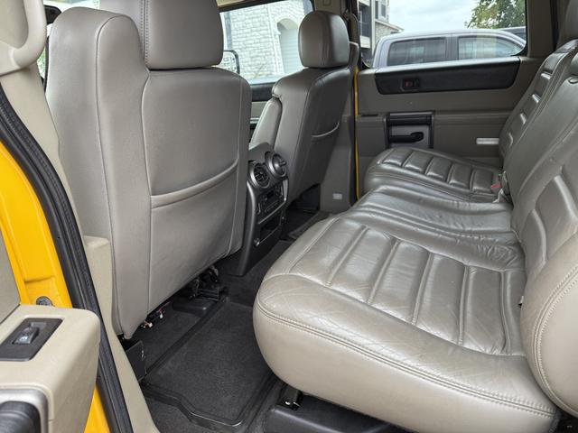Photo of 2003 Yellow Hummer H2