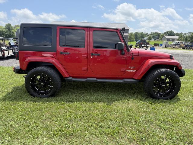 Photo of 2011 Red Jeep Wrangler Unlimited