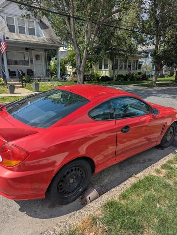 Photo of 2004 Red Hyundai Tiburon