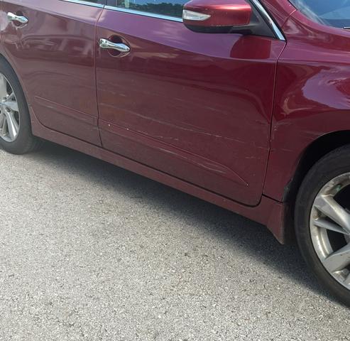 Photo of 2015 Red Nissan Altima