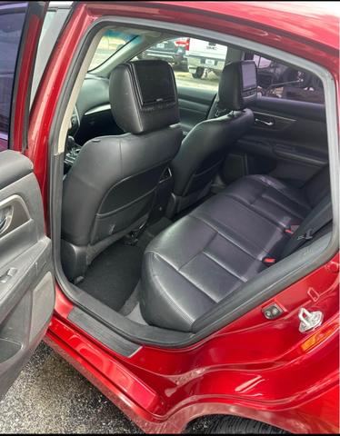 Photo of 2015 Red Nissan Altima