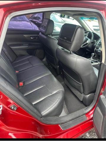 Photo of 2015 Red Nissan Altima