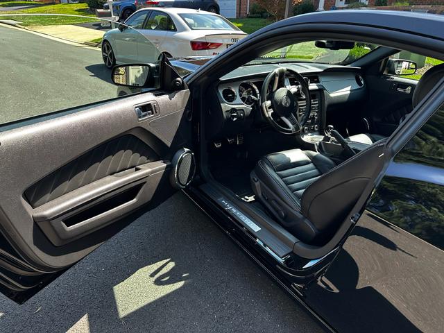 Photo of 2013 Black Ford Mustang