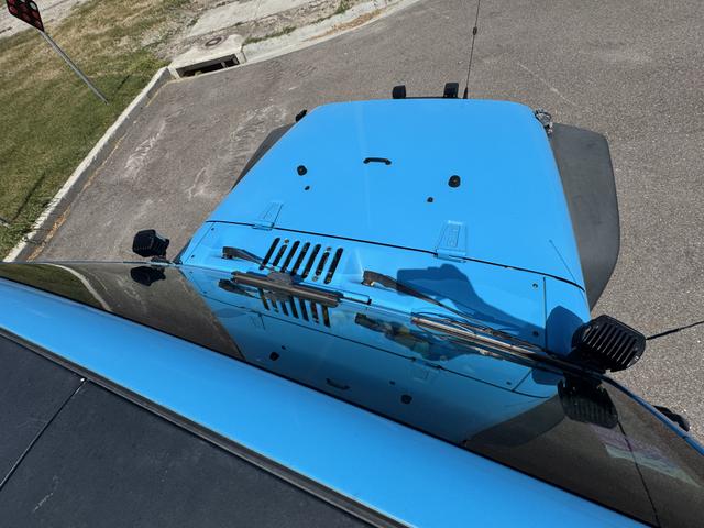 Photo of 2017 Blue Jeep Wrangler Unlimited