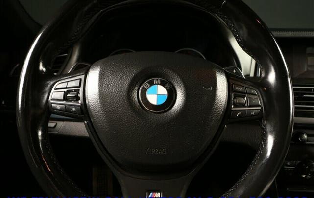 Photo of 2015 White BMW 740