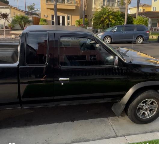 Photo of 1996 Black Nissan Pickup Truck