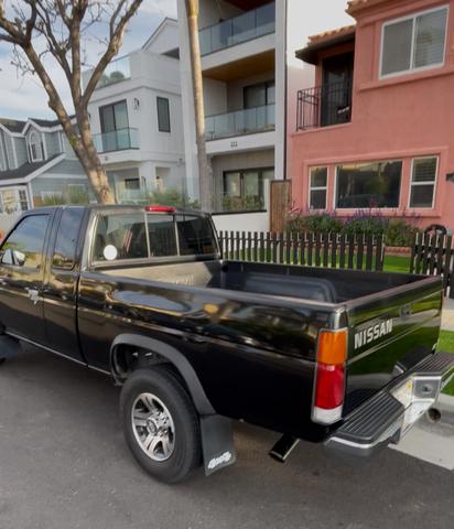 Photo of 1996 Black Nissan Pickup Truck