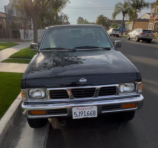 Photo of 1996 Black Nissan Pickup Truck