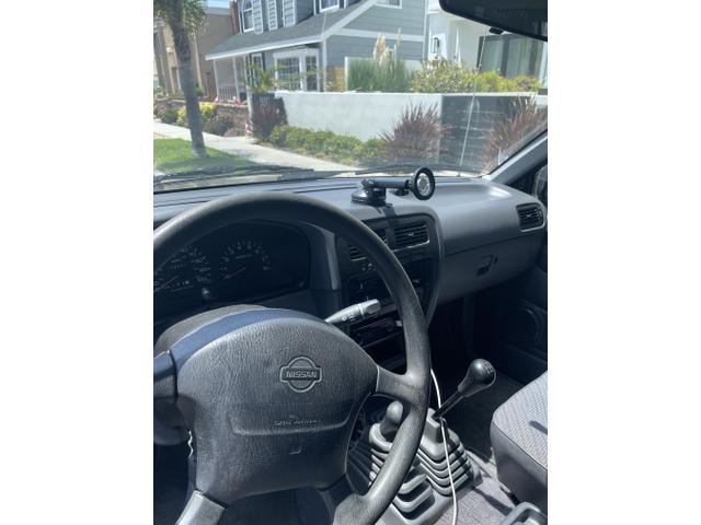 Photo of 1996 Black Nissan Pickup Truck