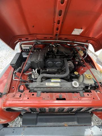 Photo of 2006 Orange Jeep Wrangler
