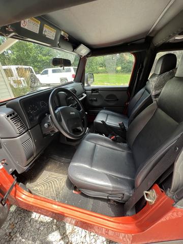 Photo of 2006 Orange Jeep Wrangler