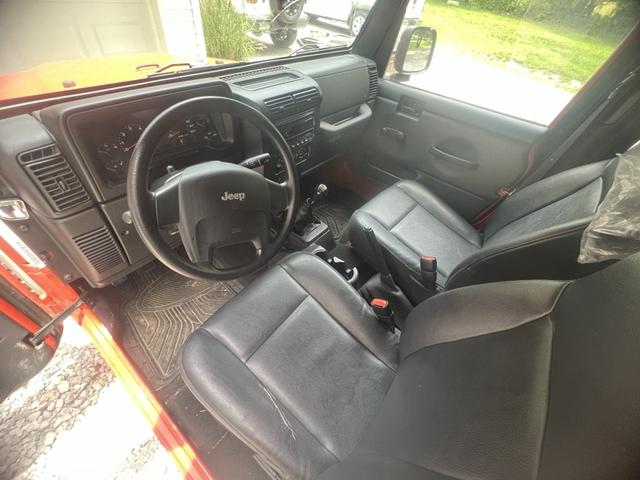Photo of 2006 Orange Jeep Wrangler