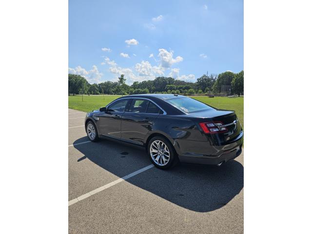 Photo of 2013 Black Ford Taurus