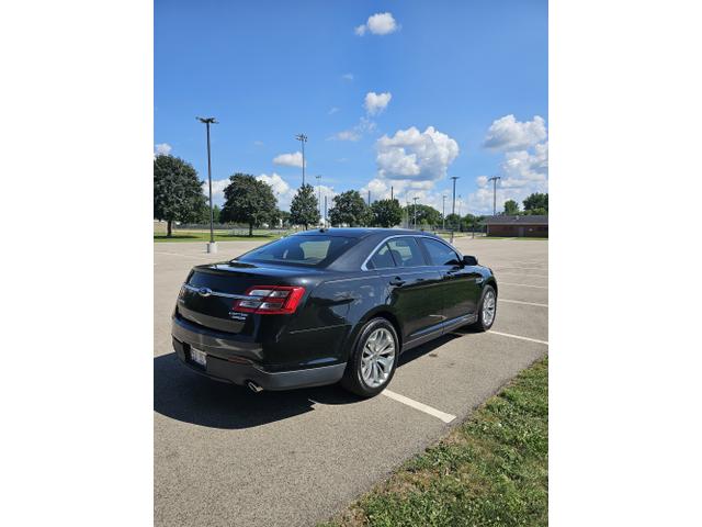 Photo of 2013 Black Ford Taurus