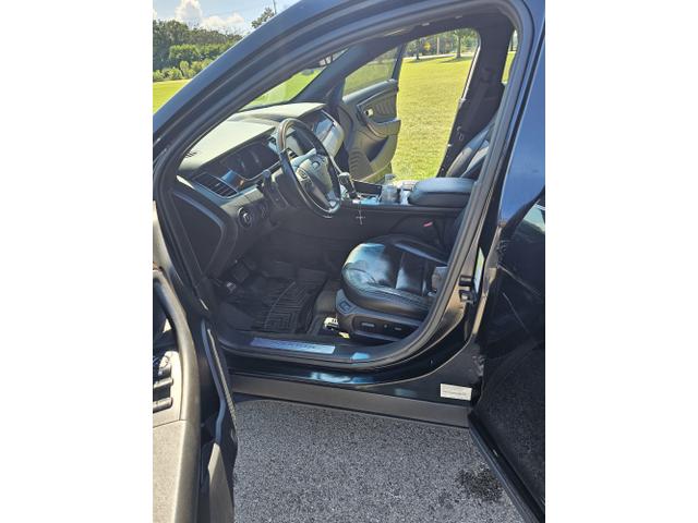 Photo of 2013 Black Ford Taurus