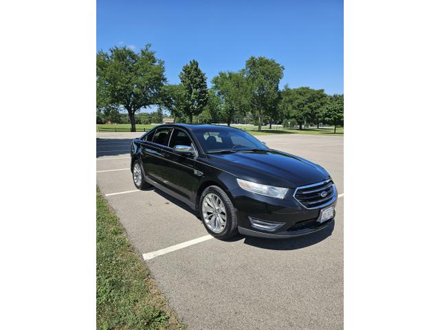 Photo of 2013 Black Ford Taurus