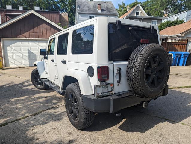 Photo of 2014 White Jeep Wrangler Unlimited