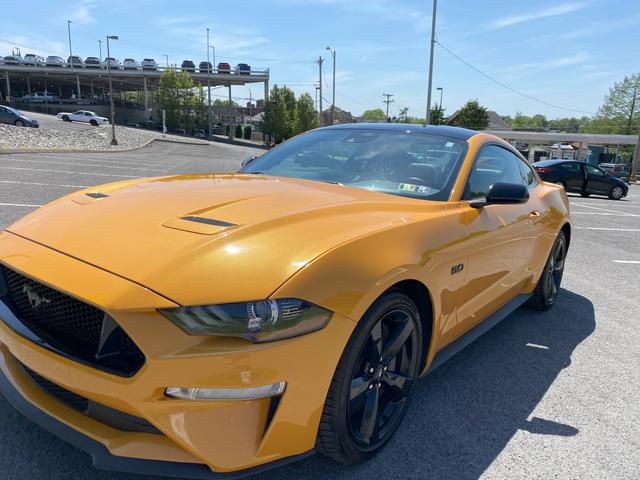 Photo of 2022 Gold Ford Mustang