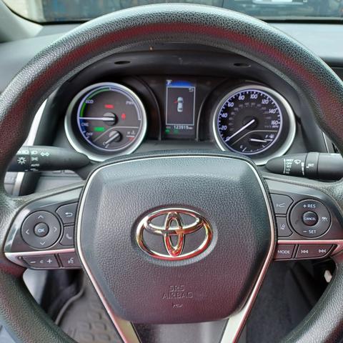 Photo of 2022 Black Toyota Camry Hybrid