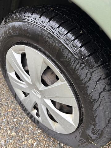 Photo of 2014 Green Subaru Impreza