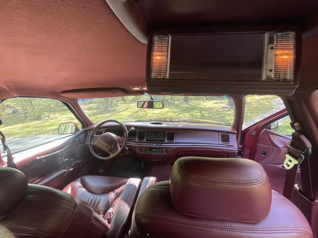 Photo of 1997 Red Lincoln Town Car