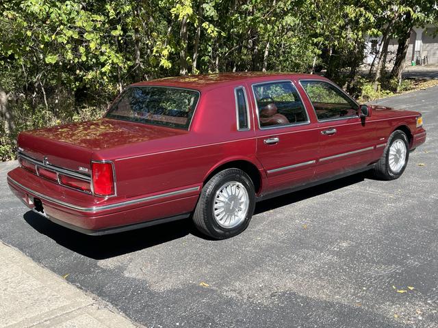 Photo of 1997 Red Lincoln Town Car