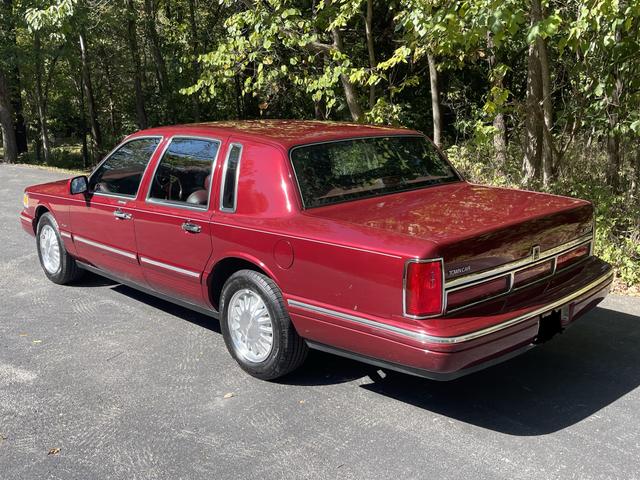Photo of 1997 Red Lincoln Town Car