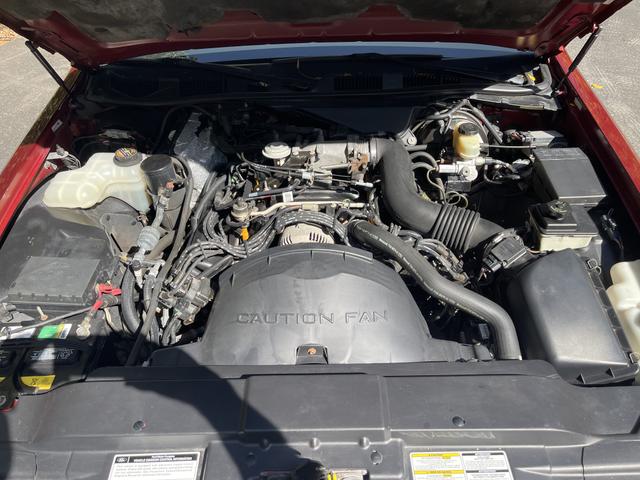 Photo of 1997 Red Lincoln Town Car