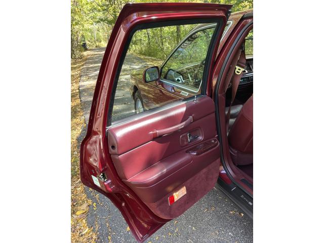 Photo of 1997 Red Lincoln Town Car