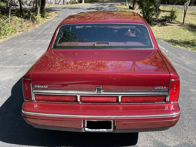 Photo of 1997 Red Lincoln Town Car