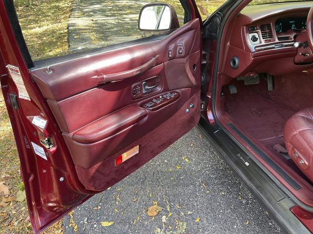 Photo of 1997 Red Lincoln Town Car