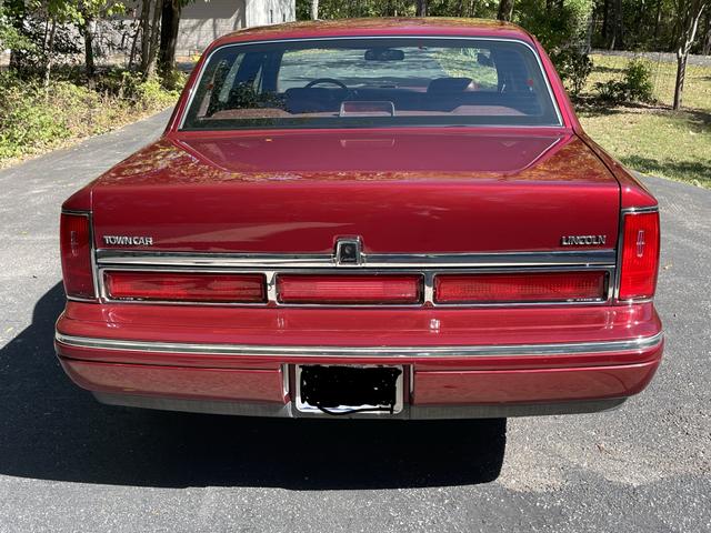 Photo of 1997 Red Lincoln Town Car