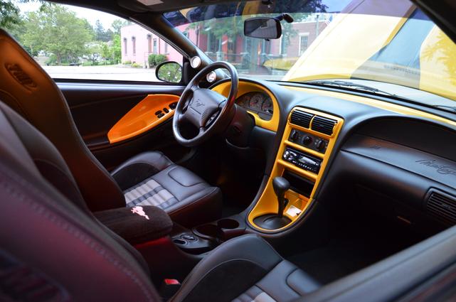 Photo of 1999 Yellow Ford Mustang