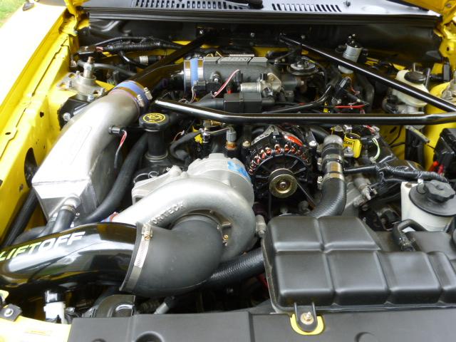 Photo of 1999 Yellow Ford Mustang
