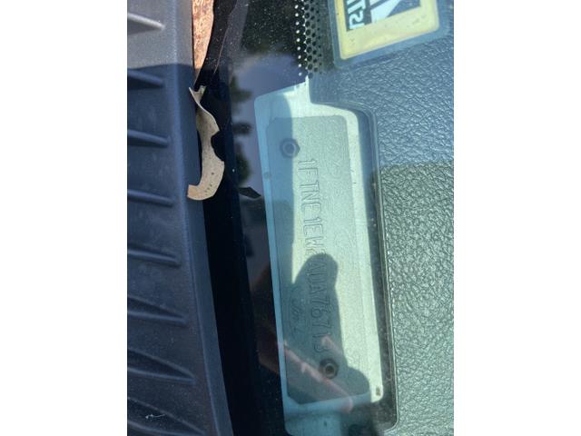 Photo of 2010 White Ford E150
